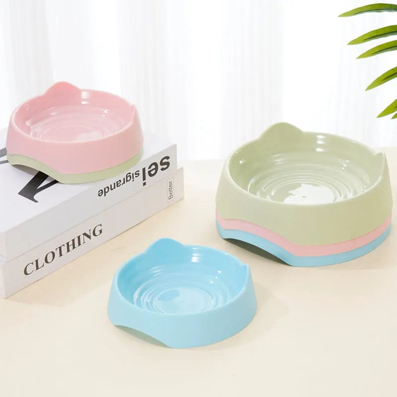 Blue ceramic dog slow feeder bowl with raised maze pattern inside for slowing down fast eaters.