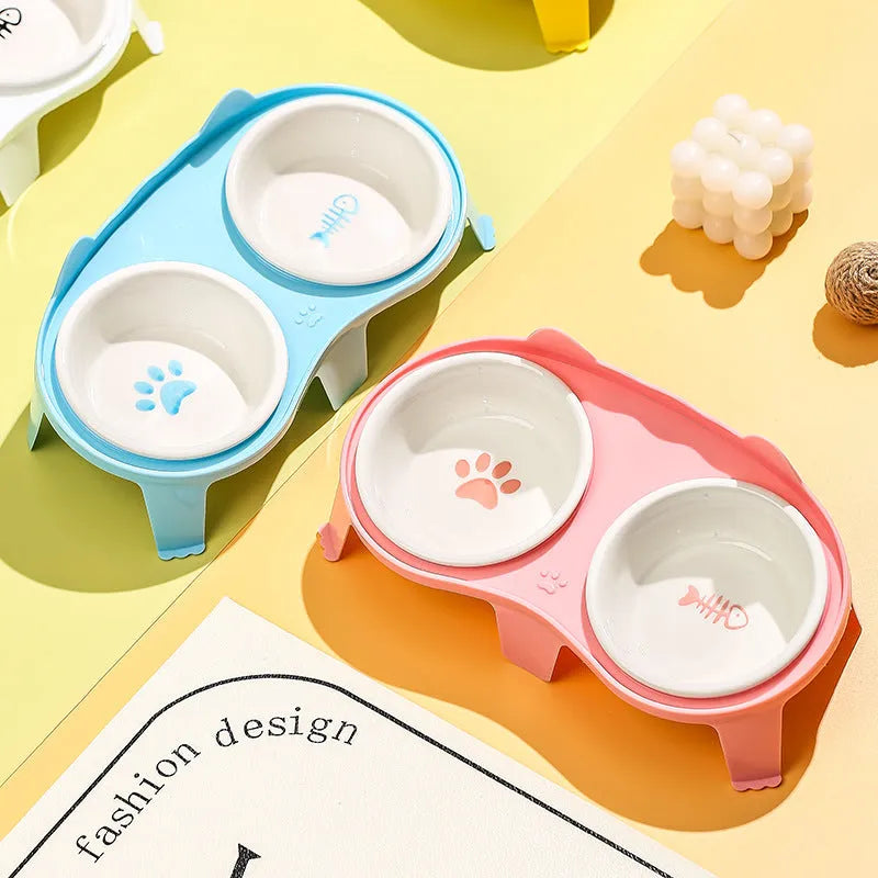 Ceramic cat food and water bowl set on elevated tilted stand with hook design in blue colour