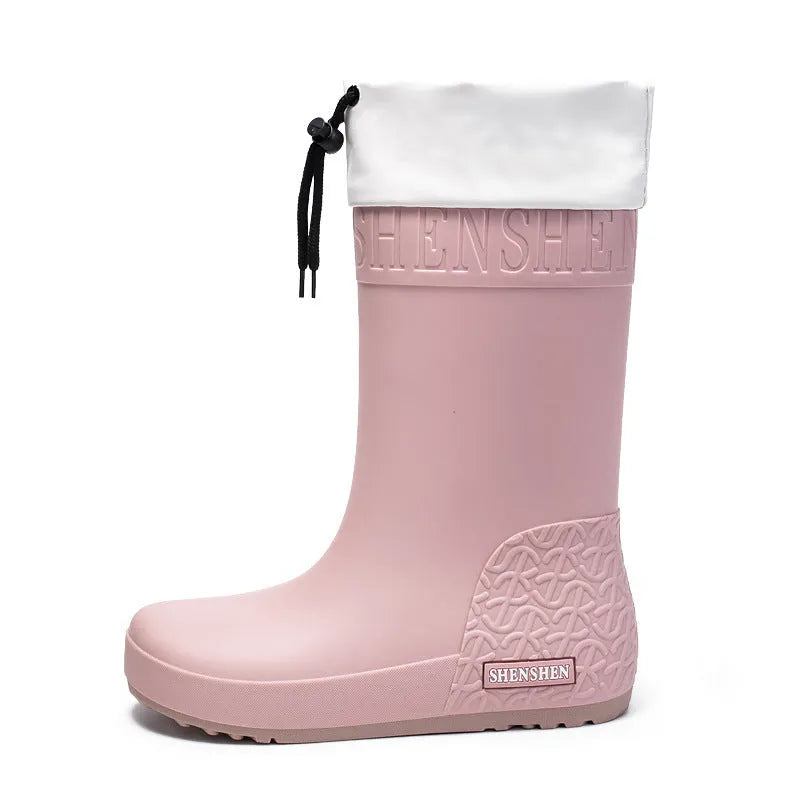 Women's PVC rain boots with non-slip soles in apricot, black, brown, or pink colours