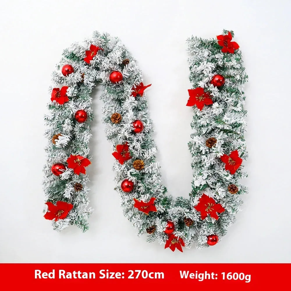 Christmas rattan garland decoration with flocked texture in five colour options displayed draped