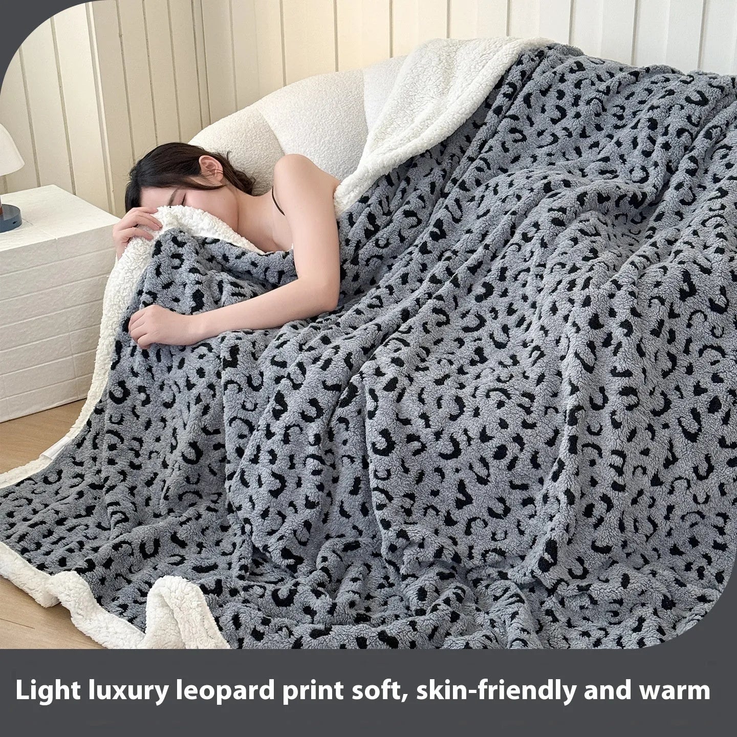 Double-layer leopard jacquard taffeta blanket in camel zebra pattern on a single bed.