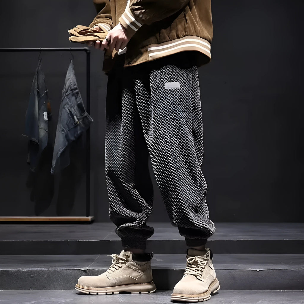 Men's grey ankle-tie casual sweatpants with straight leg design on hanger