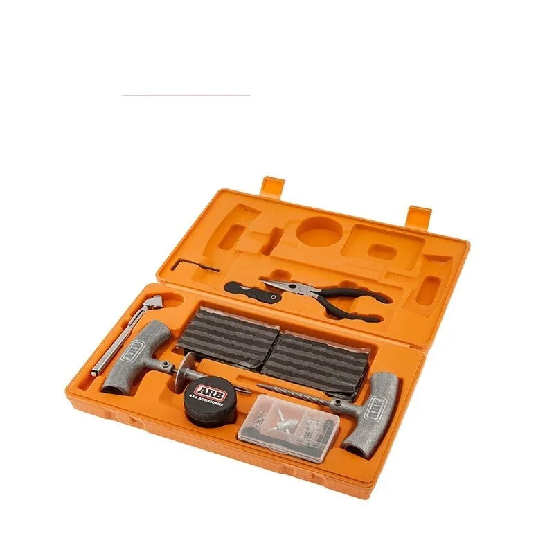 Speedy Seal emergency car tyre repair tool kit with tools laid out next to its high-visibility compact case.