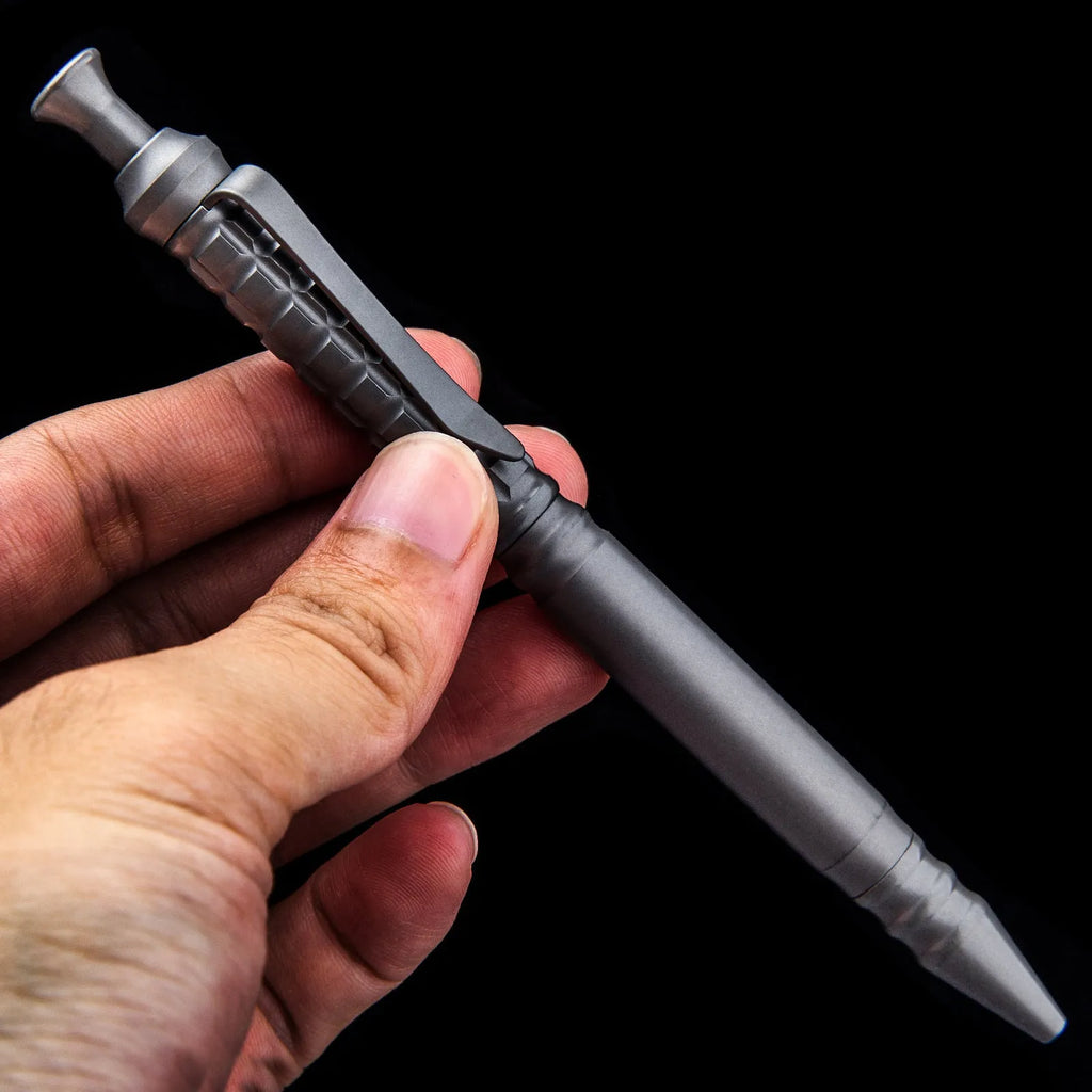 Titanium alloy tactical pen with push-action mechanism in gunmetal grey and 0.5mm nib