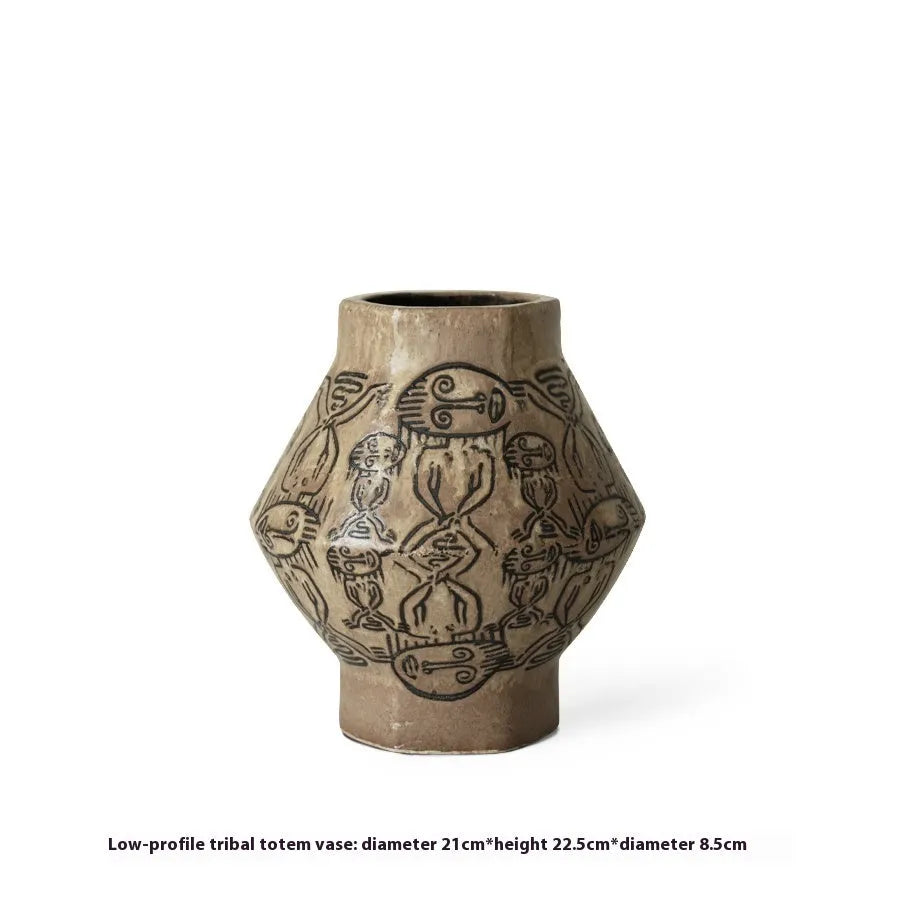 Hand-painted ceramic vase with vintage carved religious patterns in tribal totem colours