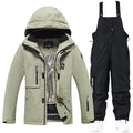 Men's and women's winter ski suit in blue and black colour combination for snow sports