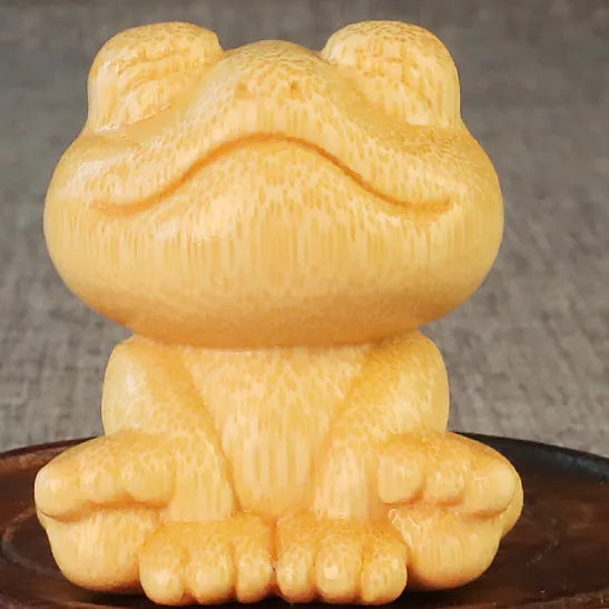 Smiling frog bamboo carving ornament measuring 5cm height with cartoon cute style decorative design
