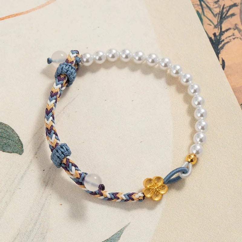 Colourful carrying strap bracelet with Chinese flower weaving and pearls in peach colour