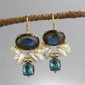 Retro vertical earrings with colored stones in geometric copper design, micro-set style