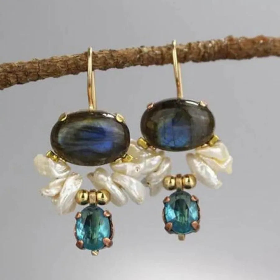 Retro vertical earrings with colored stones in geometric copper design, micro-set style