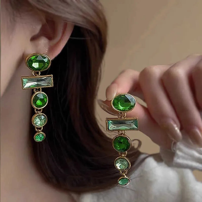 Green gradient geometric Chinese style tassel earrings with inlaid zircon detailing on alloy studs