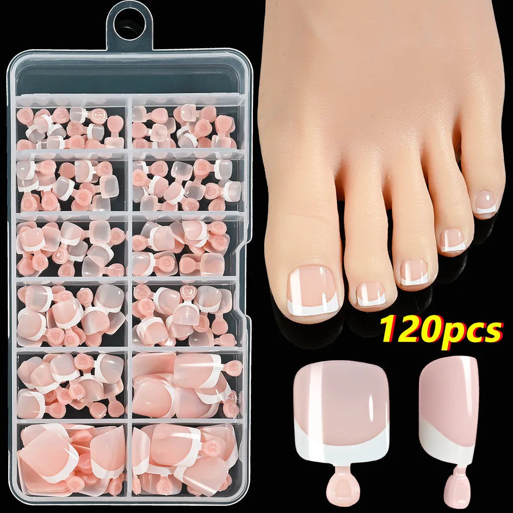 Box of 120 French white edge full square short nude toe nail tips on a white background.