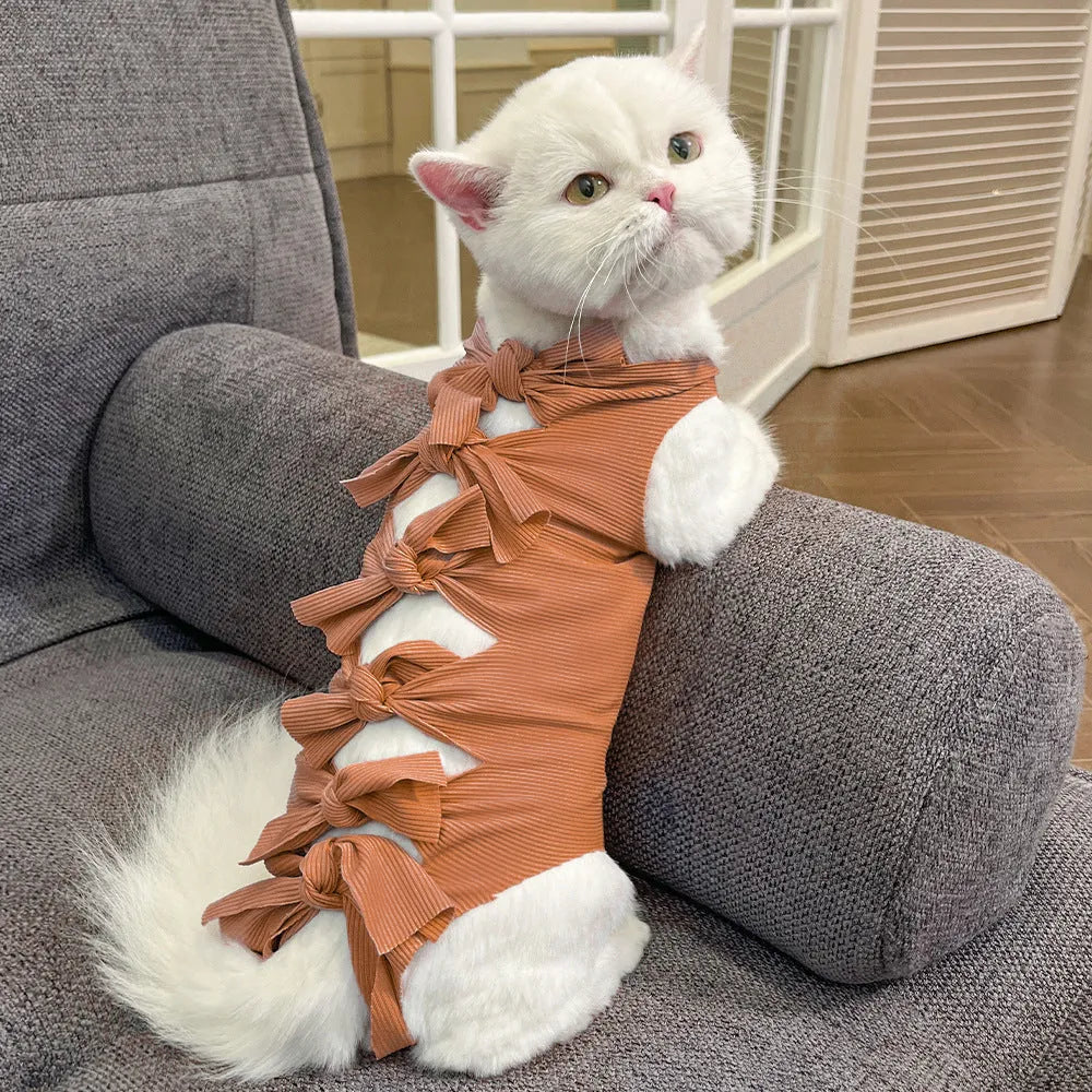 Lace-up polyester cat sterilisation clothing in blue colour showing adjustable fastening system for postoperative recovery