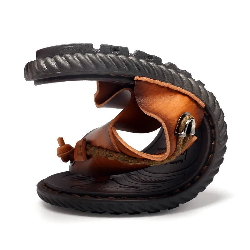 Men's dark blue herringbone-patterned outdoor slippers with a rubber sole, shown from the side.