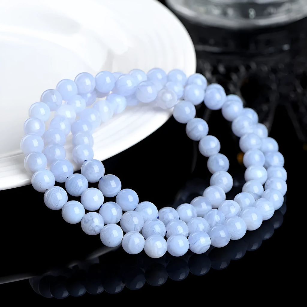 Natural blue agate bracelet with multi-circle patterns and approximately 86 beads measuring 6-6.8mm diameter