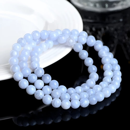 Natural blue agate bracelet with multi-circle patterns and approximately 86 beads measuring 6-6.8mm diameter