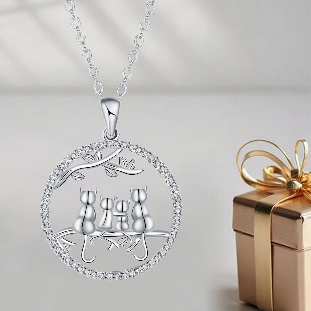 Copper necklace with four kitten pendant on cross chain, electroplated finish