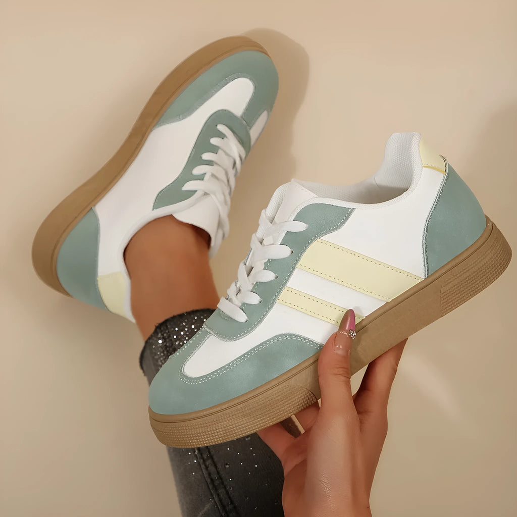 Green retro sports women's shoes with cross-strap design and low-top construction