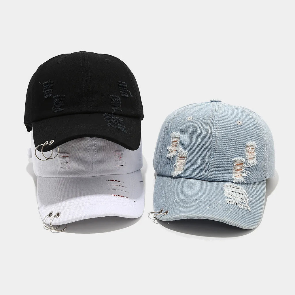 Men's black denim peaked cap with a dome crown on an adjustable strap.