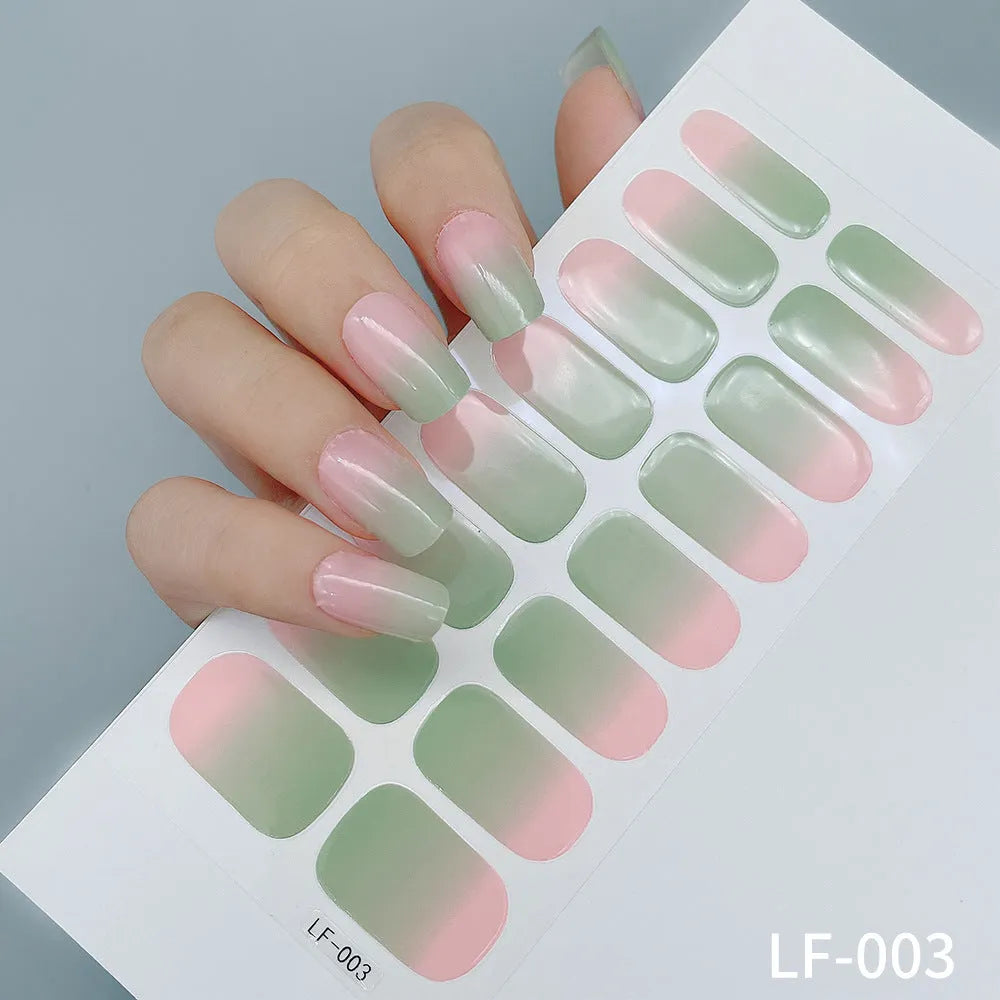 Full nail art sticker sheet showing 16 different solid colour designs including European simple nails and floral patterns