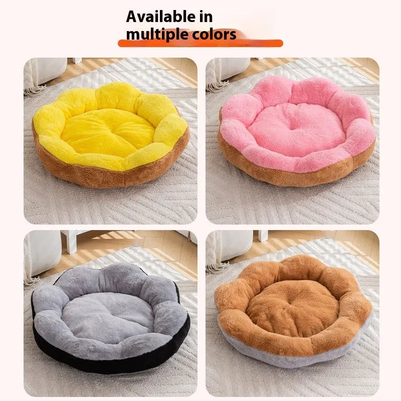 Round plush cat bed with removable cover in brown gray colour, shown in a home setting.