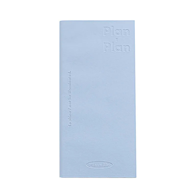 Embossed cover daily meter book notebook open on a desk, showing white 100g paper.