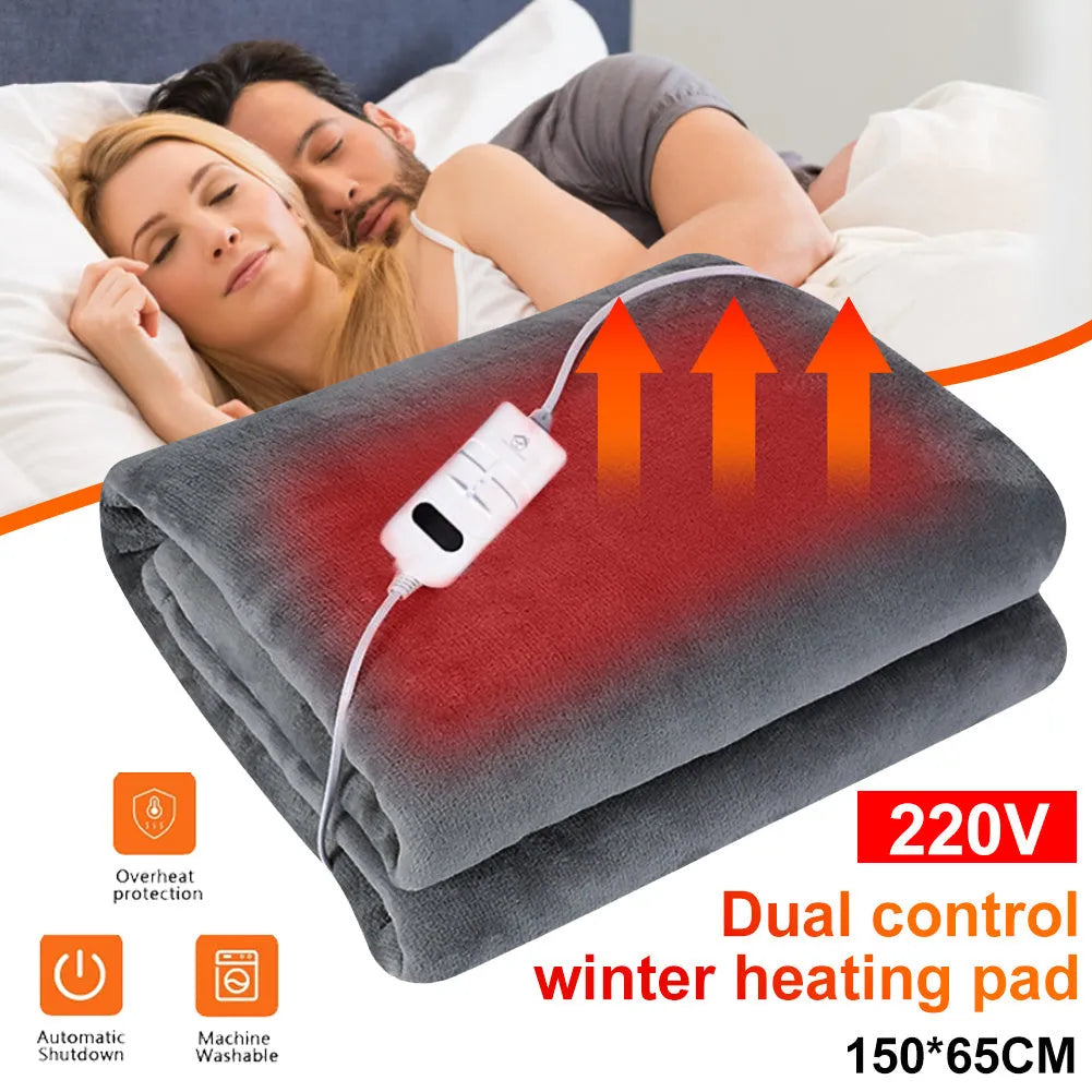 Grey tweed electric heating blanket on a bed, showing simple solid colour design