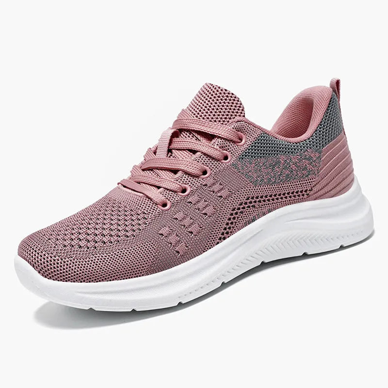 Women's low-top lace-up sneakers in black with breathable mesh upper and soft PVC sole