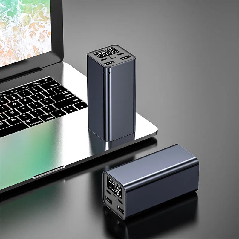 65W high power laptop charging bank with metallic casing showing USB-C port and capacity indicator