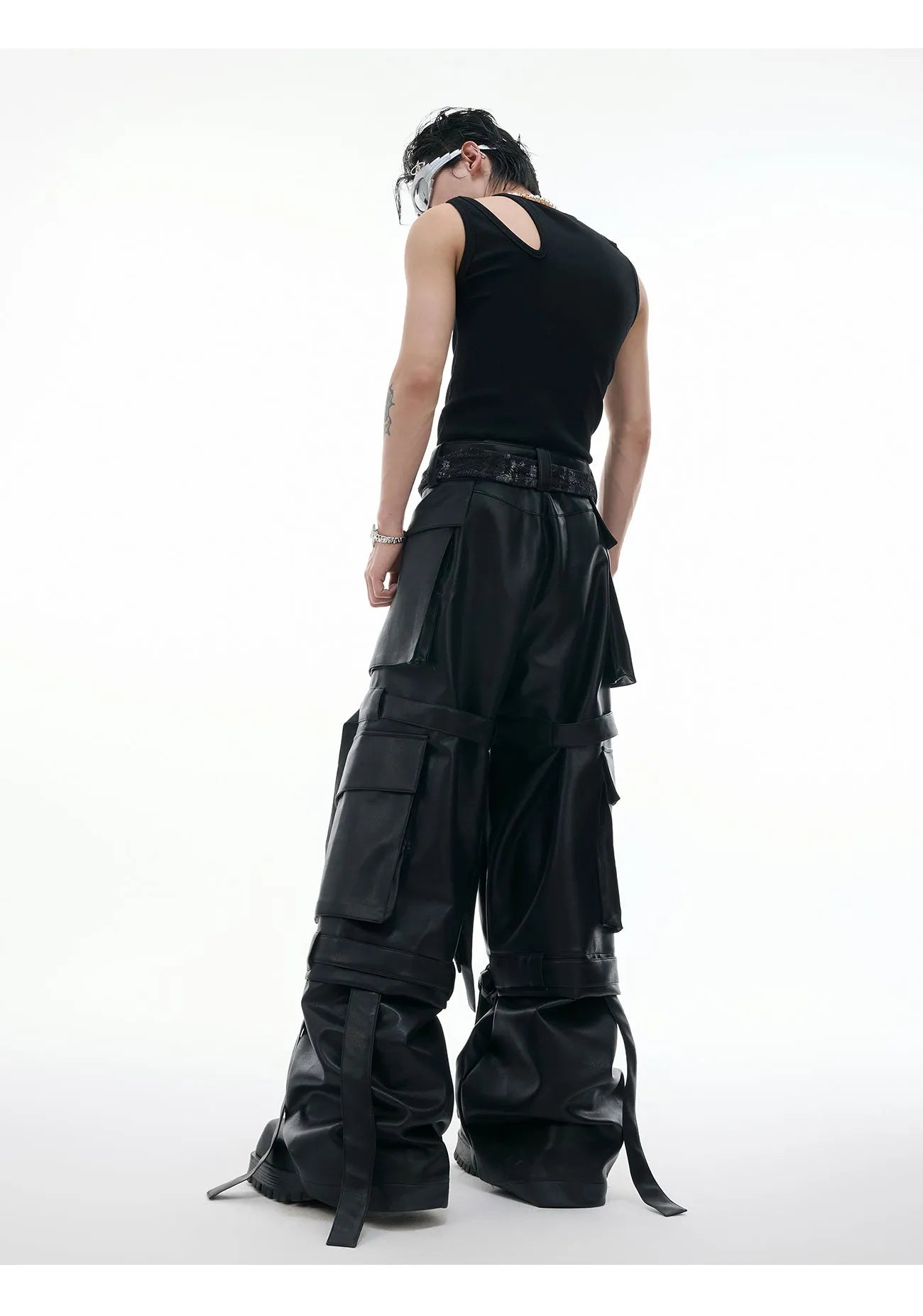 Black loose fit men's retro pants with quilted ribbon detailing and multiple pockets