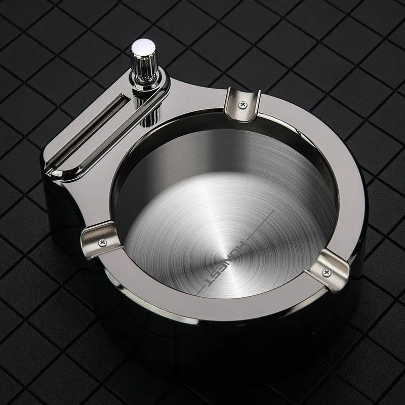 Large blue metal cigarette ashtray with a built-in permanent match lighter and three cigarette slots.