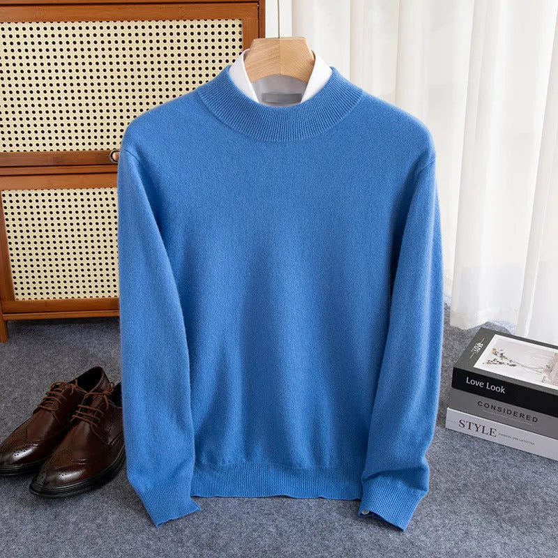 Man wearing a loose-fit half-collar wool sweater in a textured knit, shown in one of the available colours like camel or dark grey.