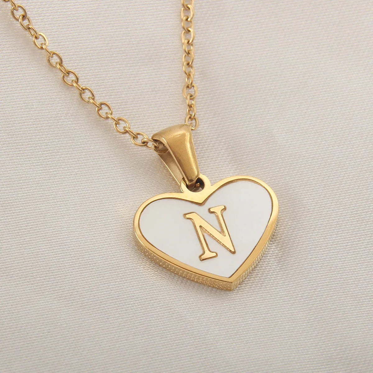 Gold plated personalised heart necklace with white shell on a 45cm chain