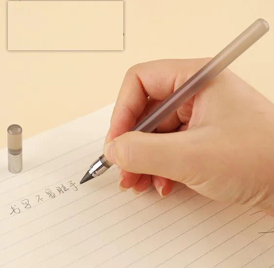 Transparent acrylic eternal pencil with alloy pen head showing internal mechanism