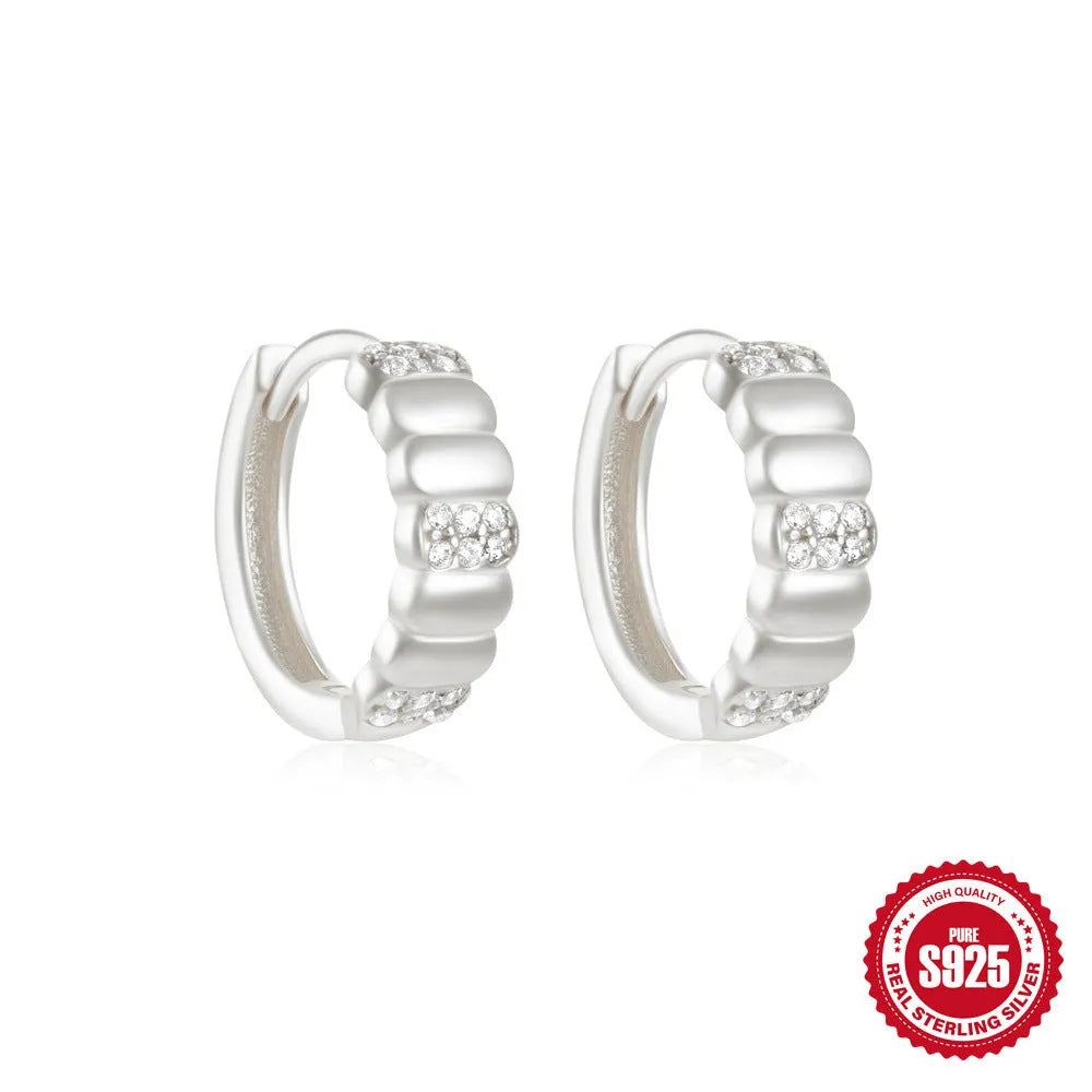 Sterling silver geometric stud earrings with diamond detailing in gold or silver finish