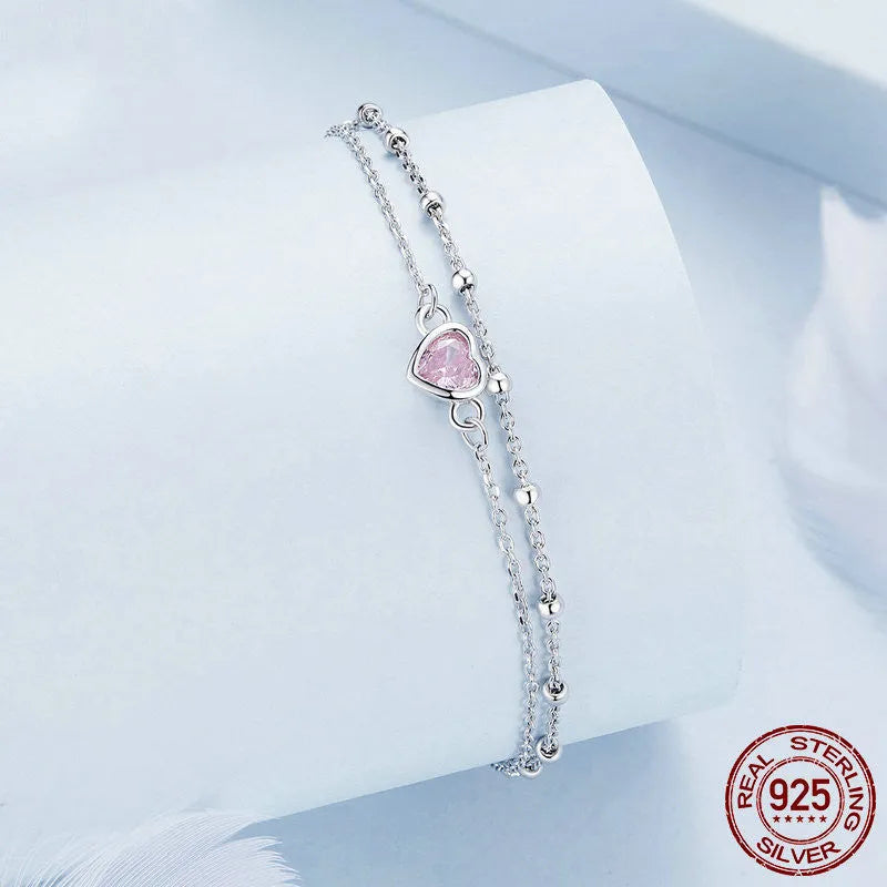 925 sterling silver bracelet with small heart pendant on an adjustable chain, style BSB152.