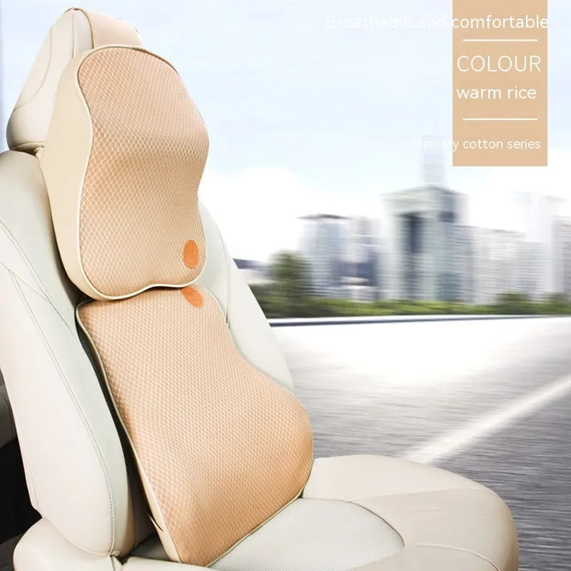 Black and brown memory foam car headrest pillow and lumbar support cushion set on a car seat.