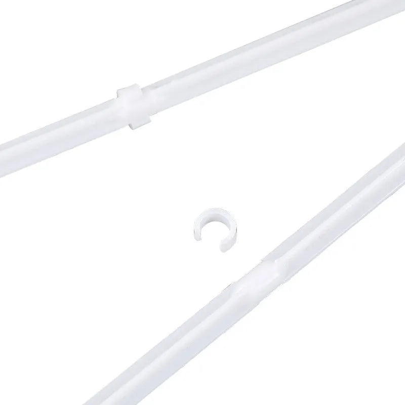 Ten white plastic car window flag pole holder clips on a flat surface.