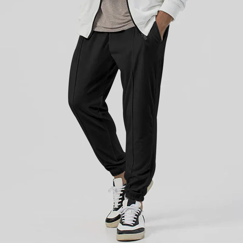 Men's casual track sweatpants in loose tapered straight-leg design showing army green colour option