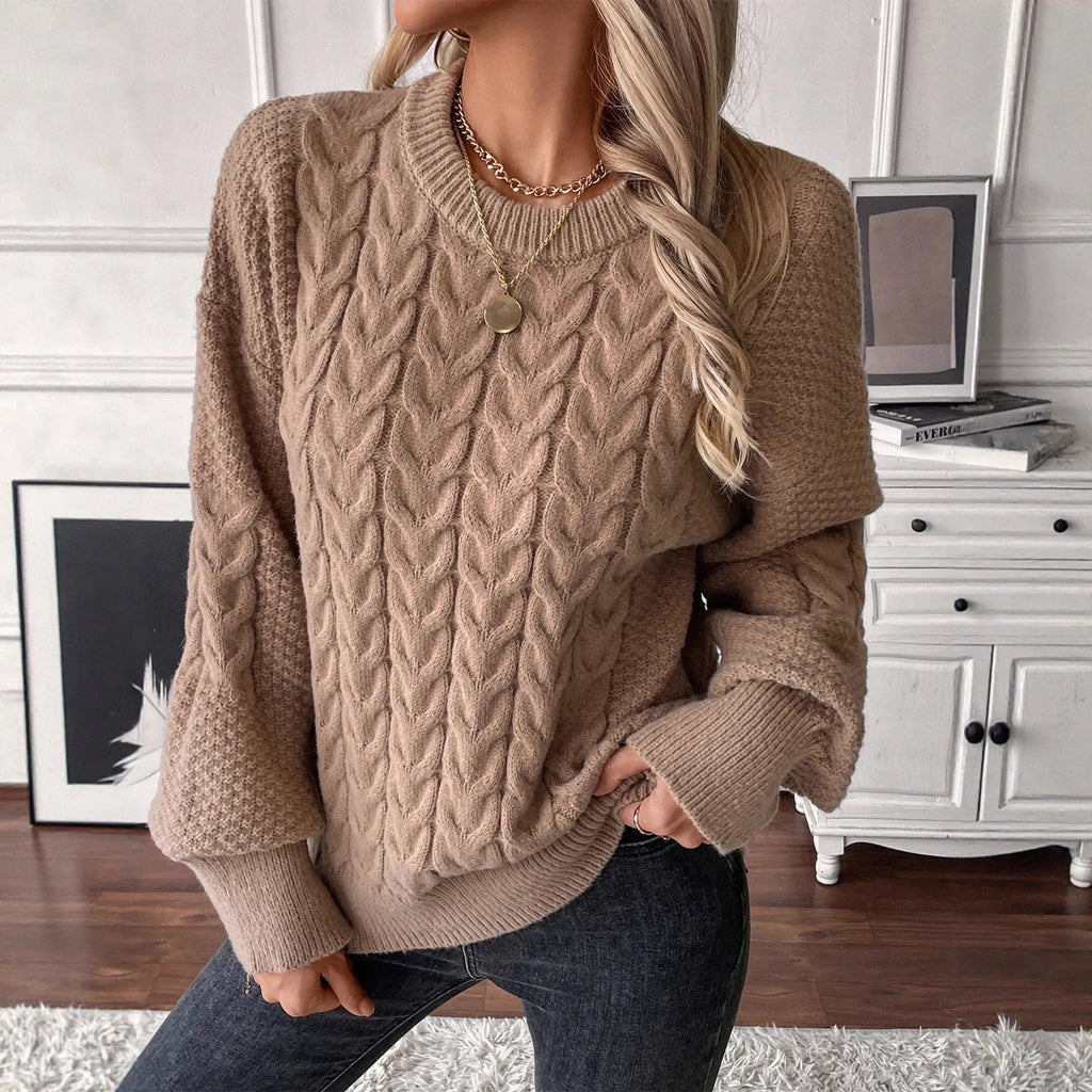 Women's beige loose sweater with twist stitch pattern and round neck
