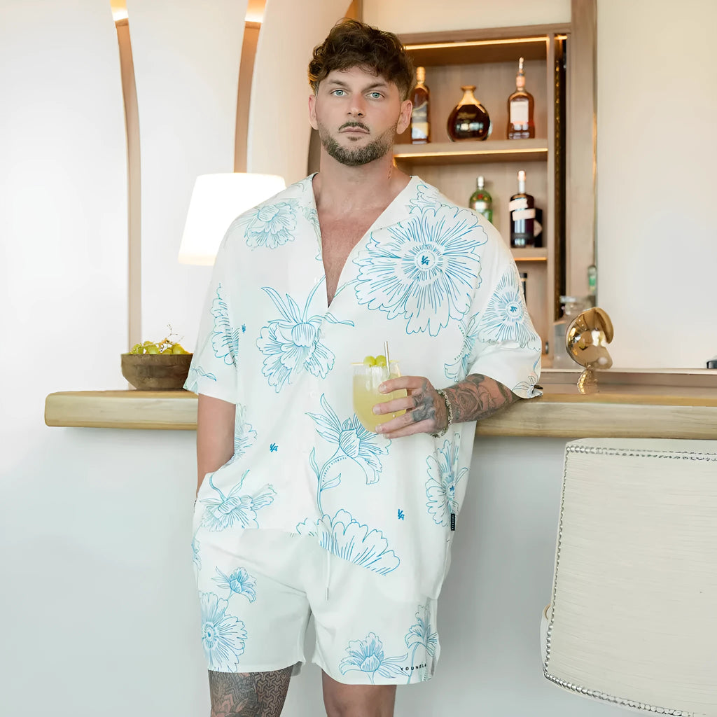 Men's loose fit floral print short sleeve top in polyester fabric shown in beige colour