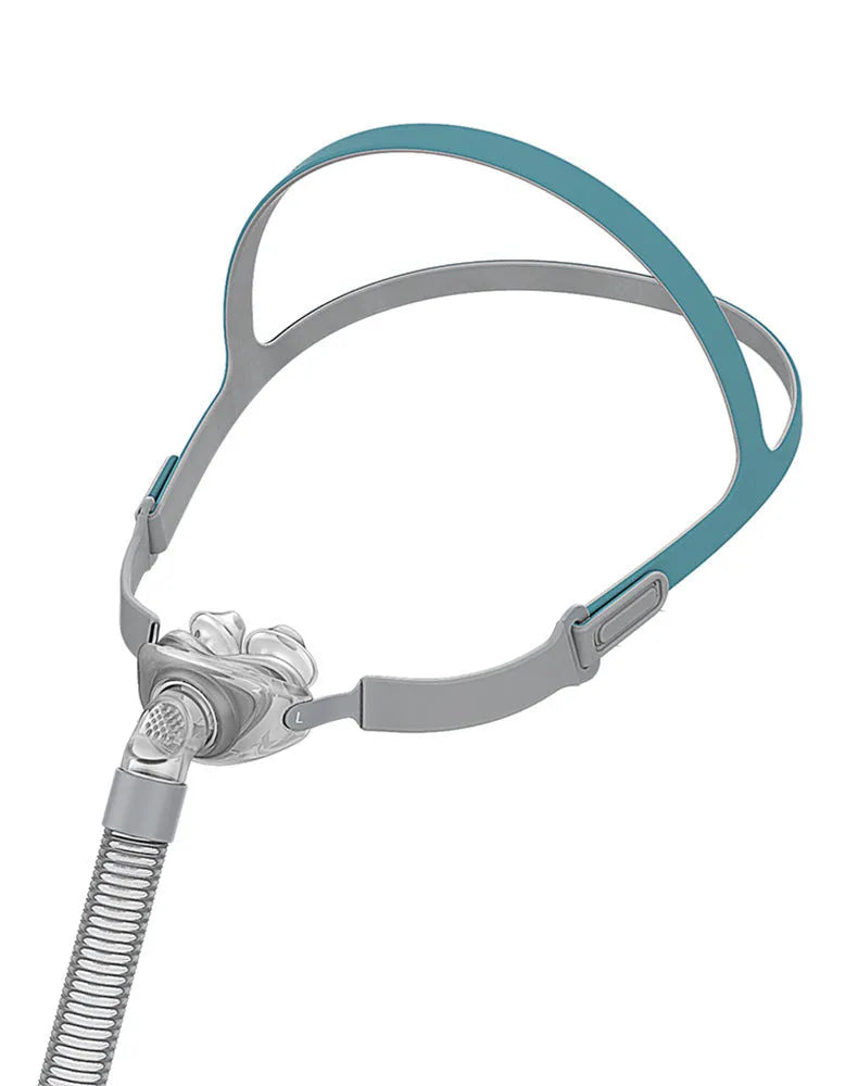 Ventilator nasal pillow mask kit showing nose pad, silicone cushion and headband components