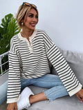 Black striped women's knitted top with drop-shoulder long sleeves and button details