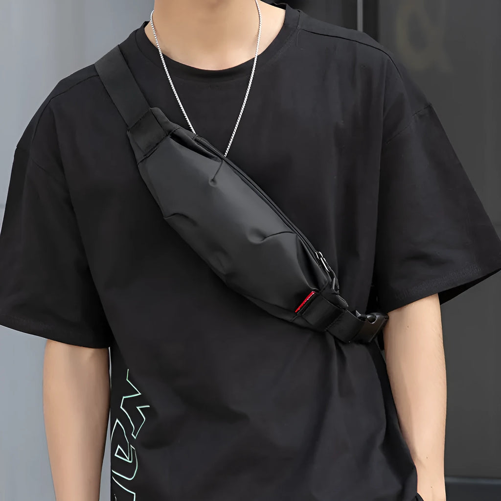 Black Oxford cloth crossbody bag with internal organisation pockets for mobile phone and ID