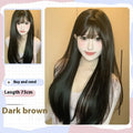 Dark brown long straight synthetic wig with a fringe on a wig head stand.