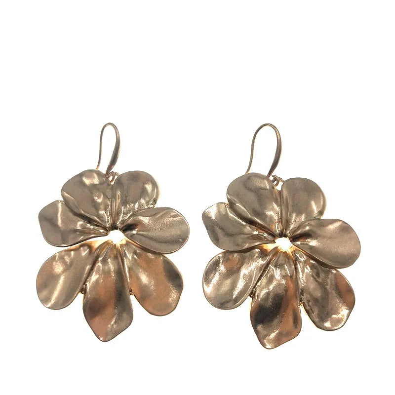Vintage-style distressed leaf earrings for women in alloy, original silver colour finish on a plain background