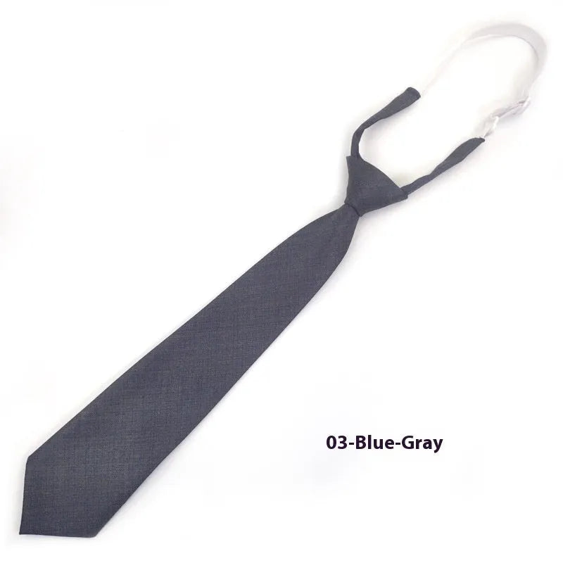 Men's solid colour cotton bow tie in arrow style showing navy blue option
