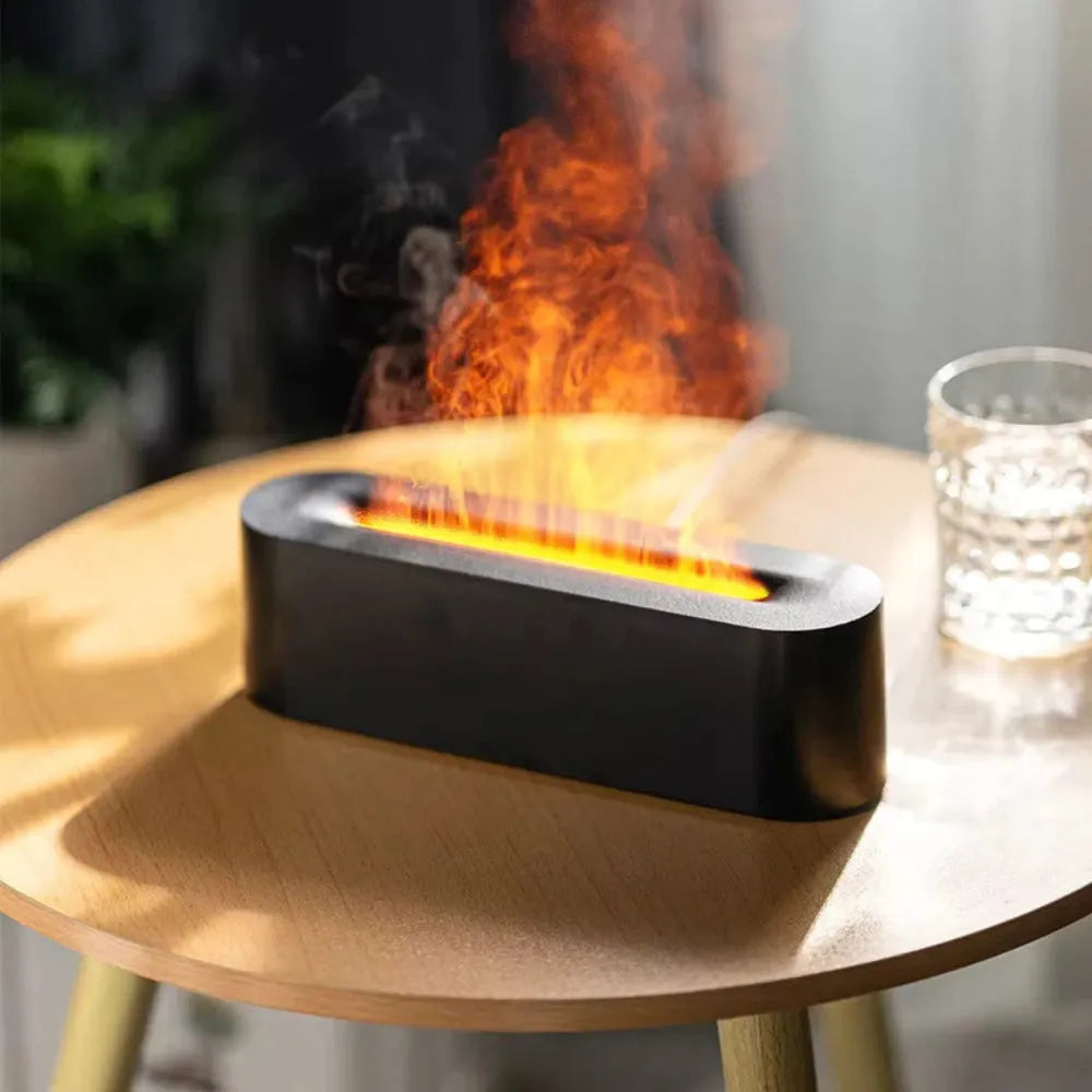 Square black lava flame aroma diffuser humidifier with USB cable on desktop