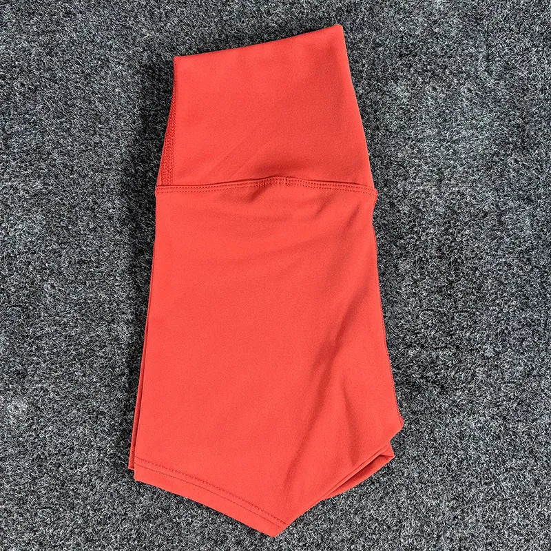 Women's high-waist yoga shorts in nylon fabric for running, sports, and cycling activities