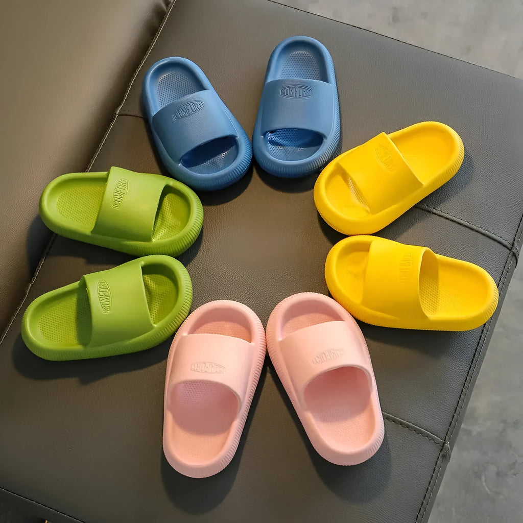 Children's EVA slippers with non-slip soles in mixed colour options showing size range